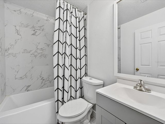 703 SUNRIDGE WOODS BOULEVARD, Davenport, FL 33837