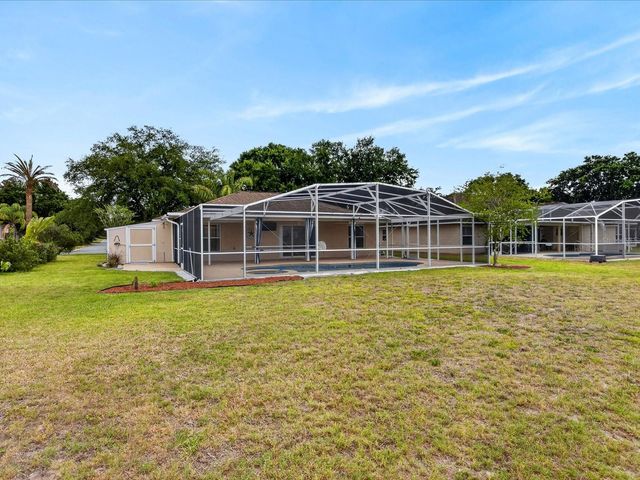703 SUNRIDGE WOODS BOULEVARD, Davenport, FL 33837