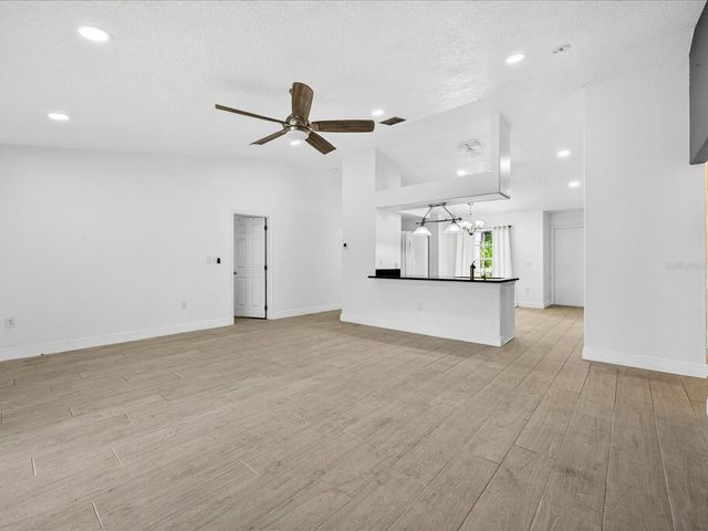 703 SUNRIDGE WOODS BOULEVARD, Davenport, FL 33837