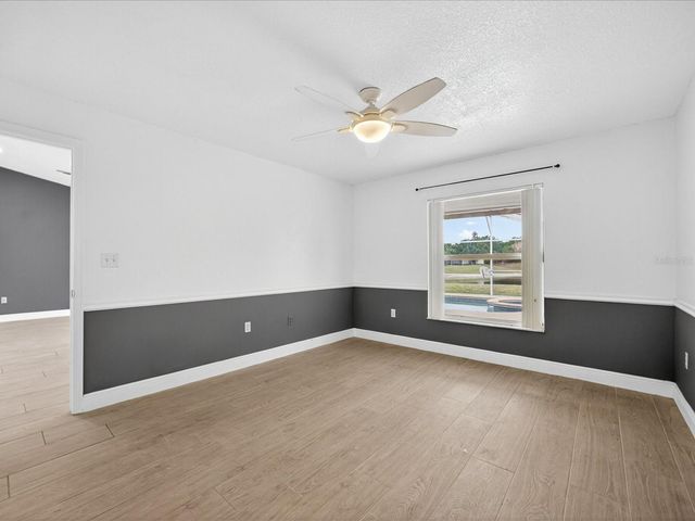 703 SUNRIDGE WOODS BOULEVARD, Davenport, FL 33837