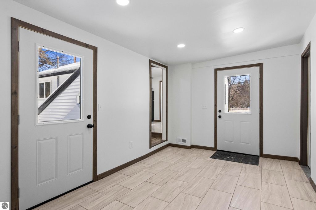 Image 3 of property listing at 905 N Bridge Street, Bellaire, MI 49615