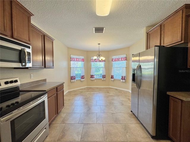 1445 WALLACE MANOR PASS, Winter Haven, FL 33880
