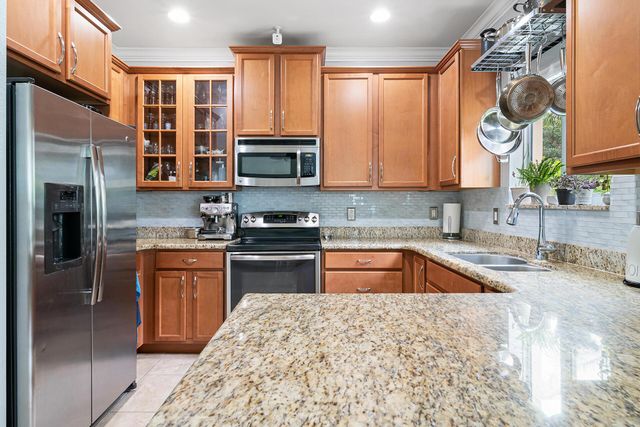 4725 Foxtail Palm Court, Greenacres, FL 33463