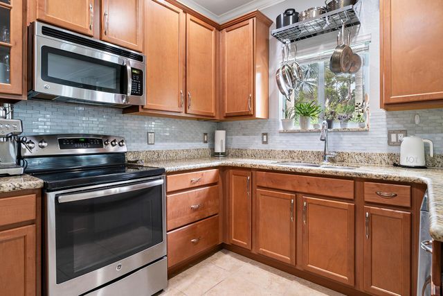 4725 Foxtail Palm Court, Greenacres, FL 33463
