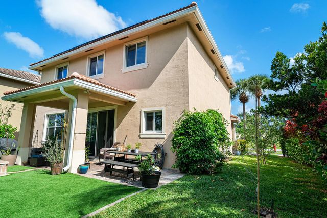 4725 Foxtail Palm Court, Greenacres, FL 33463