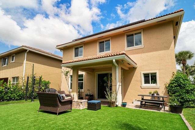 4725 Foxtail Palm Court, Greenacres, FL 33463