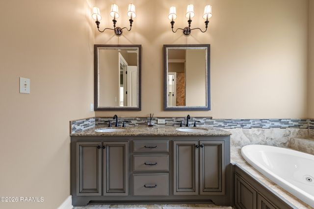 104 Flora Springs Drive, Youngsville, LA 70592