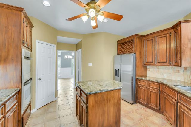 7619 Limber Bough Drive, Humble, TX 77346