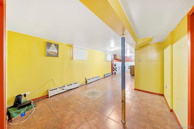 9037 77th Street, Woodhaven, NY 11421