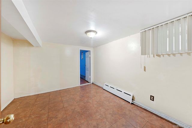 9037 77th Street, Woodhaven, NY 11421