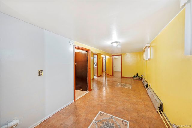 9037 77th Street, Woodhaven, NY 11421