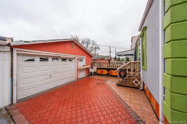 9037 77th Street, Woodhaven, NY 11421