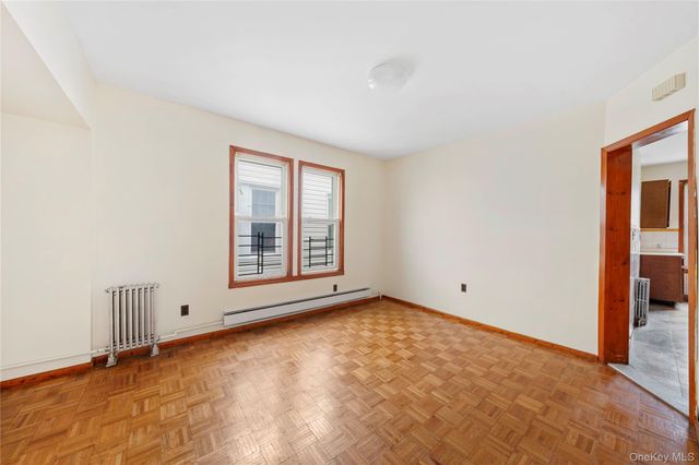 9037 77th Street, Woodhaven, NY 11421