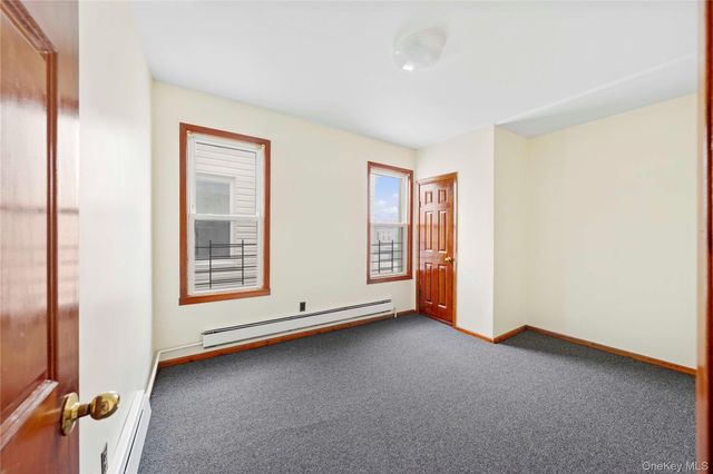 9037 77th Street, Woodhaven, NY 11421