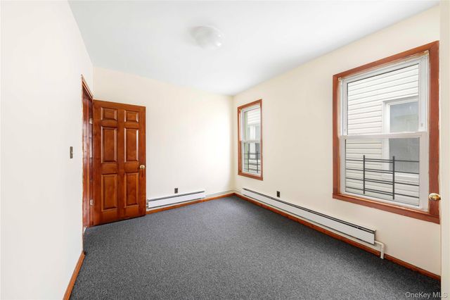 9037 77th Street, Woodhaven, NY 11421