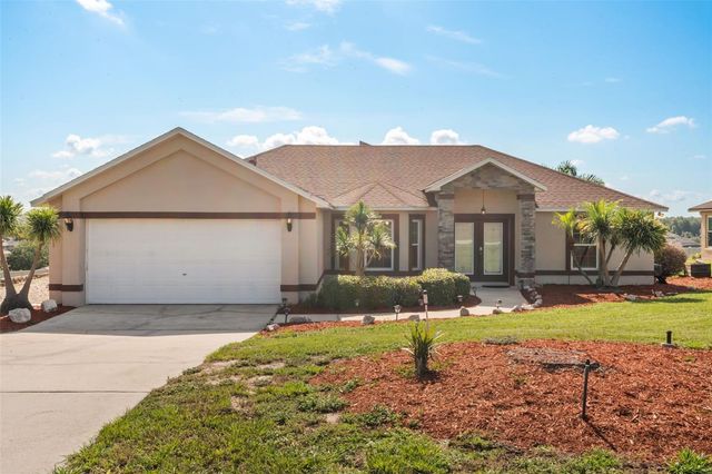 11501 AUTUMN WIND LOOP, Clermont, FL 34711