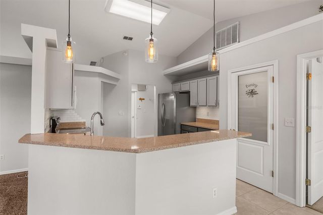 11501 AUTUMN WIND LOOP, Clermont, FL 34711