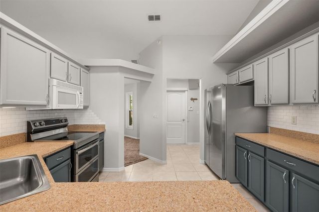 11501 AUTUMN WIND LOOP, Clermont, FL 34711