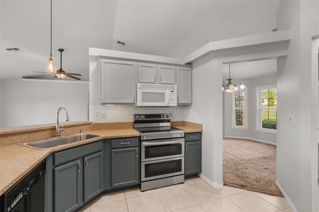 11501 AUTUMN WIND LOOP, Clermont, FL 34711
