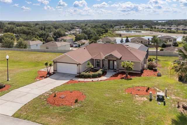 11501 AUTUMN WIND LOOP, Clermont, FL 34711