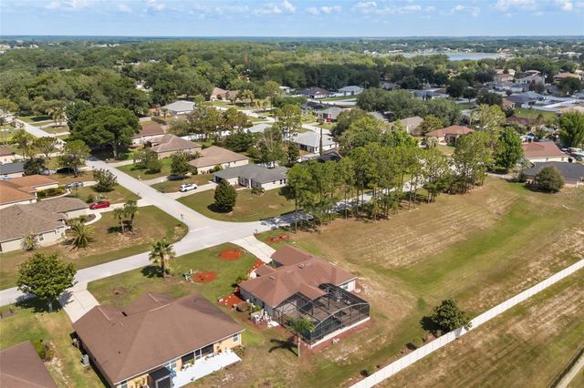 11501 AUTUMN WIND LOOP, Clermont, FL 34711
