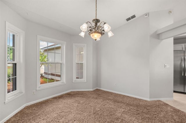 11501 AUTUMN WIND LOOP, Clermont, FL 34711