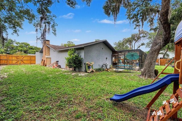 3110 SHADOW OAKS DRIVE, Holiday, FL 34690