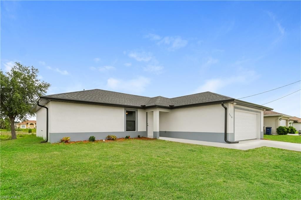 2714 25th ST SW, LEHIGH ACRES, FL 33976 — photo 2