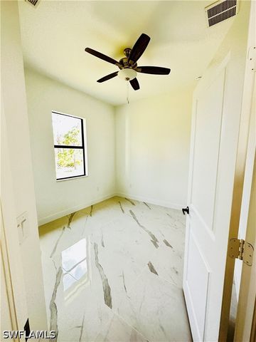 717 Genoa AVE S, Lehigh Acres, FL 33974