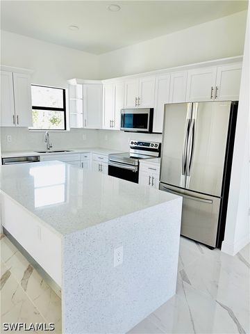 717 Genoa AVE S, Lehigh Acres, FL 33974