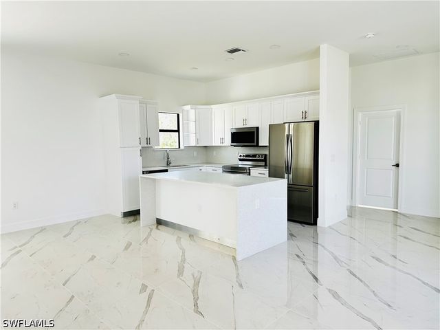 717 Genoa AVE S, Lehigh Acres, FL 33974