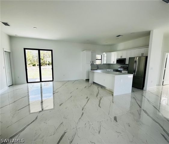 717 Genoa AVE S, Lehigh Acres, FL 33974