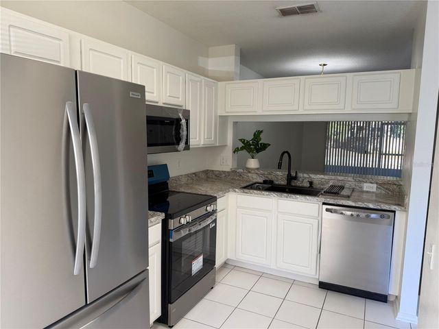 1206 KENNEWICK COURT, Wesley Chapel, FL 33543