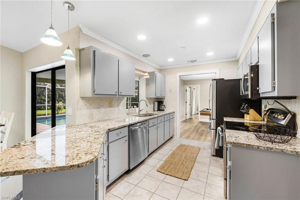 801 SW 52nd ST, CAPE CORAL, FL 33914 — photo 2