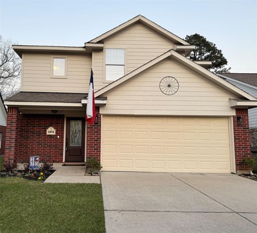 6894 Stillwater Drive, Willis, TX 77318