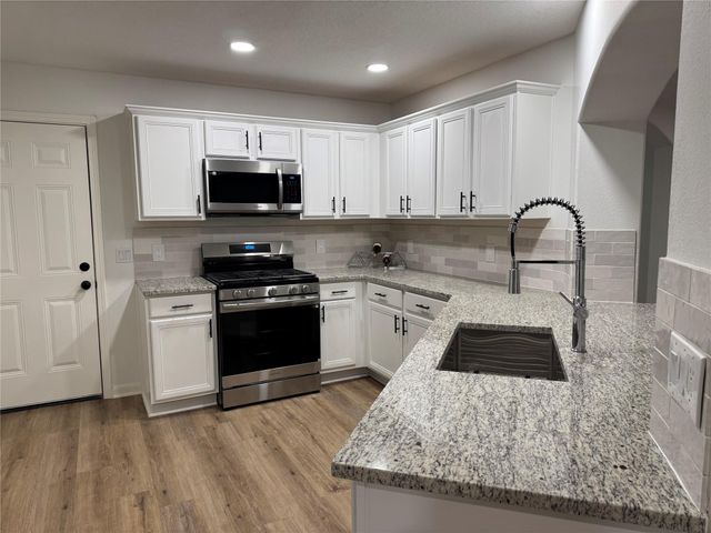 6894 Stillwater Drive, Willis, TX 77318