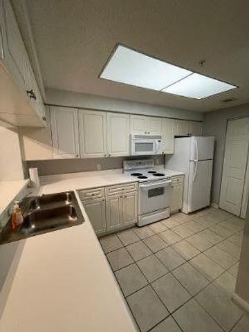 3022 Alcazar Place 103, Palm Beach Gardens, FL 33410