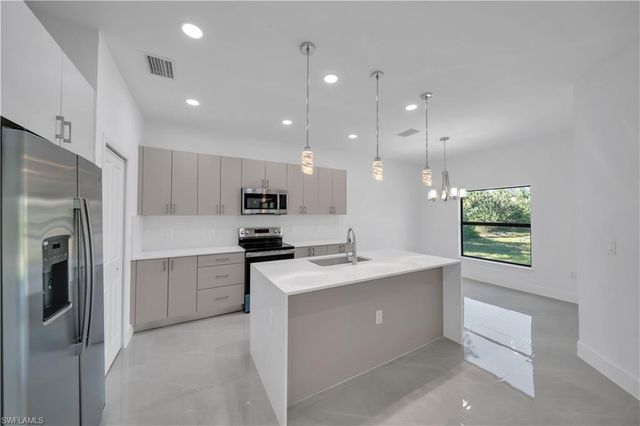 302 Palisades AVE, Lehigh Acres, FL 33974