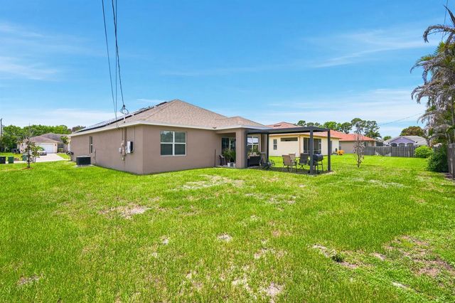 1771 SW Lofgren Avenue, Port St. Lucie, FL 34953