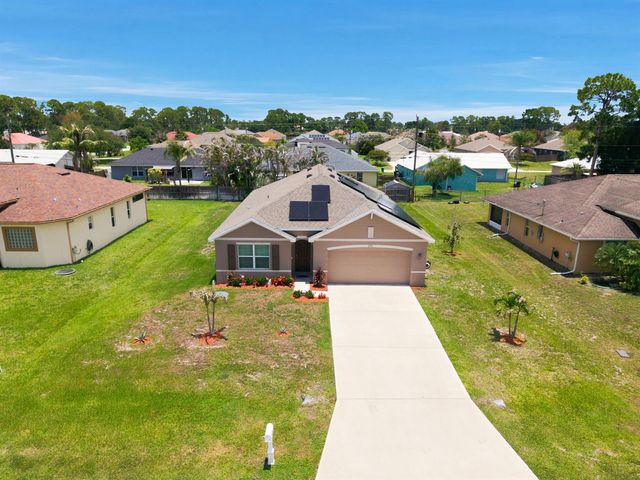 1771 SW Lofgren Avenue, Port St. Lucie, FL 34953