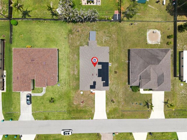 1771 SW Lofgren Avenue, Port St. Lucie, FL 34953