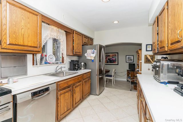 63 Marlborough Court, Rockville Centre, NY 11570