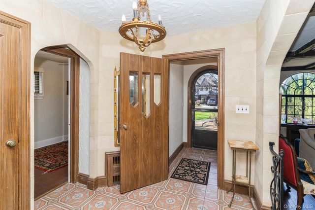 63 Marlborough Court, Rockville Centre, NY 11570