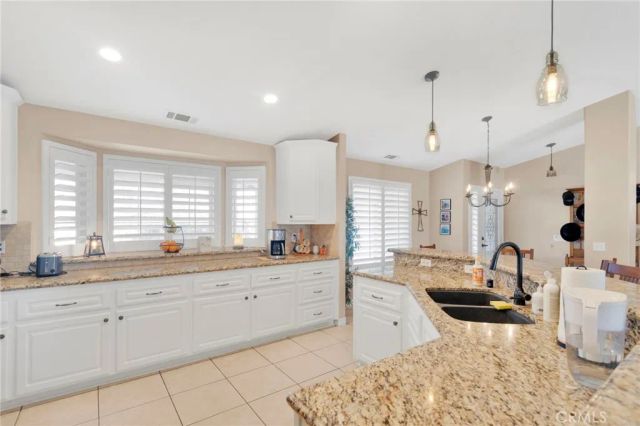 8695 Cantel Court, Oak Hills, CA 92344