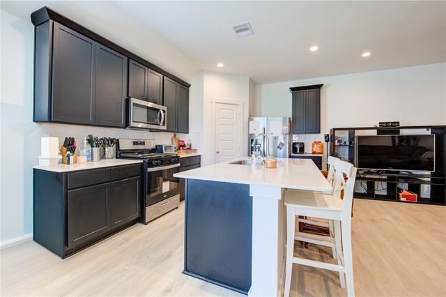 1106 Isola Bella Drive, Richmond, TX 77406