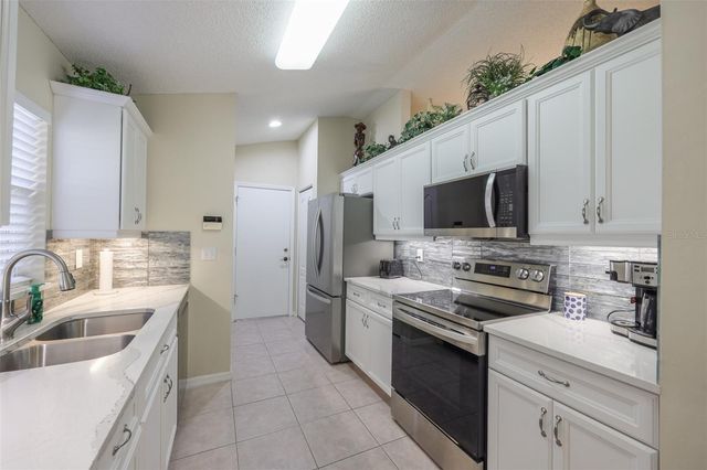 930 VILLEROY GREENS DRIVE, Sun City Center, FL 33573