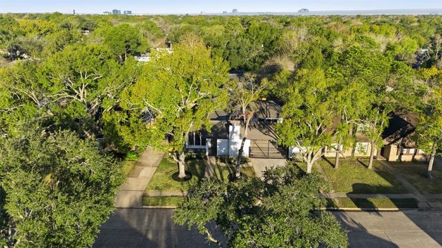 12034 Sugar Springs Drive, Houston, TX 77077