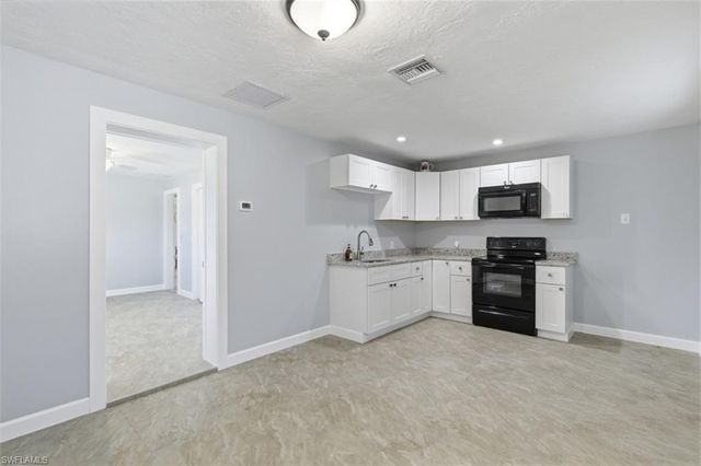 1437 Alwynne DR N, Lehigh Acres, FL 33936