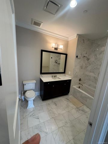 1000 Royal Court 1201, New Hyde Park, NY 11040