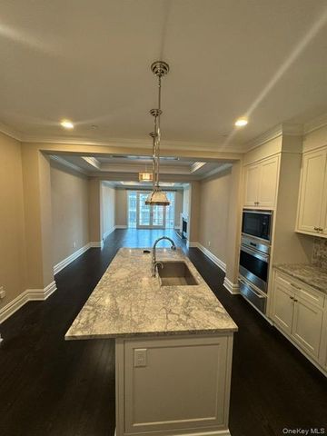 1000 Royal Court 1201, New Hyde Park, NY 11040